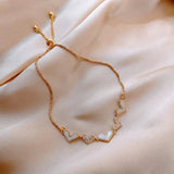 Léna - Állítható arany szív karkötő