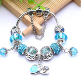 Léna - Rózsaarany karkötő kék cirkónia kövekkel